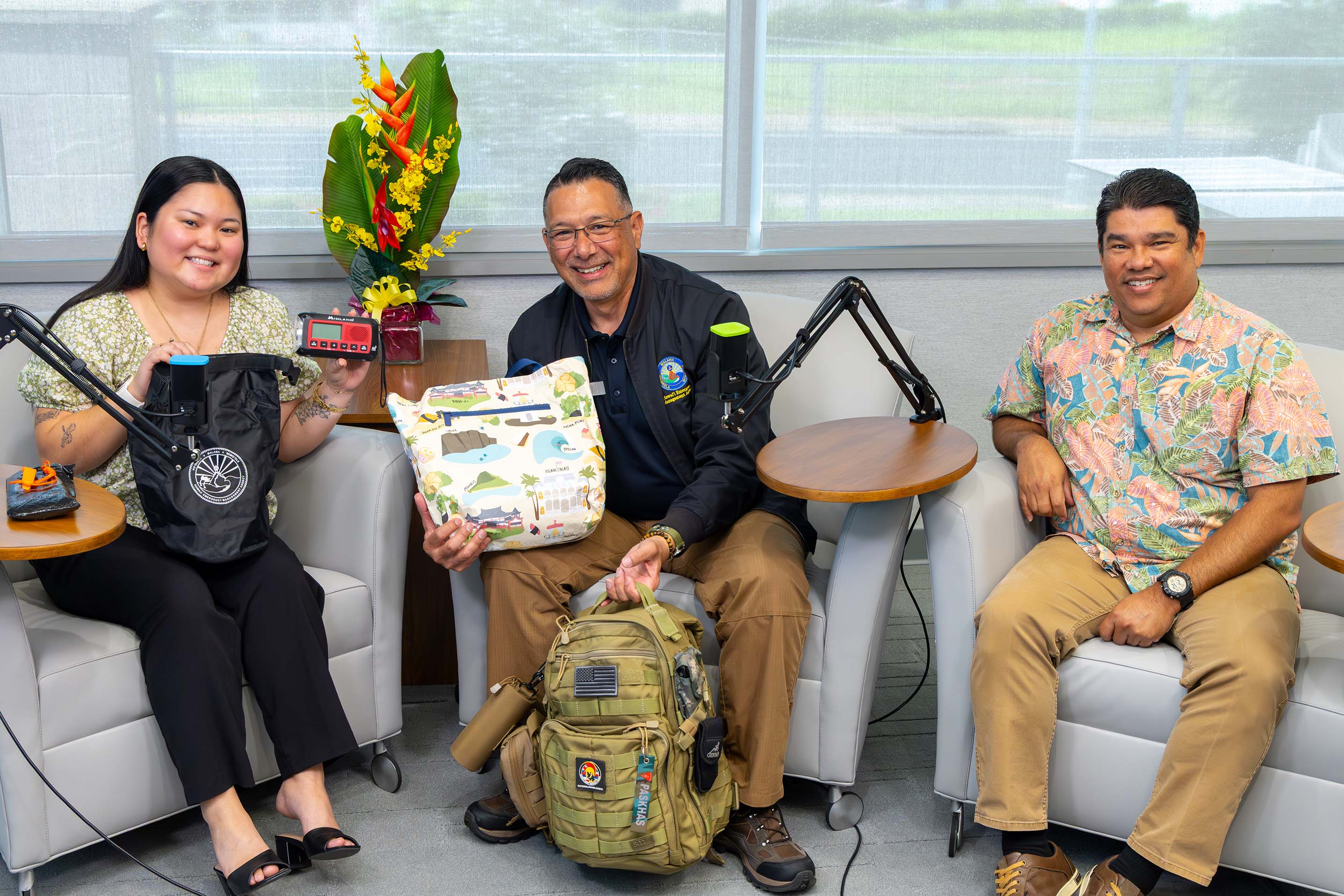 Business Development Officer, Jordyn Nakaguma, with Administrator James Barros and John Vierra of HIEMA