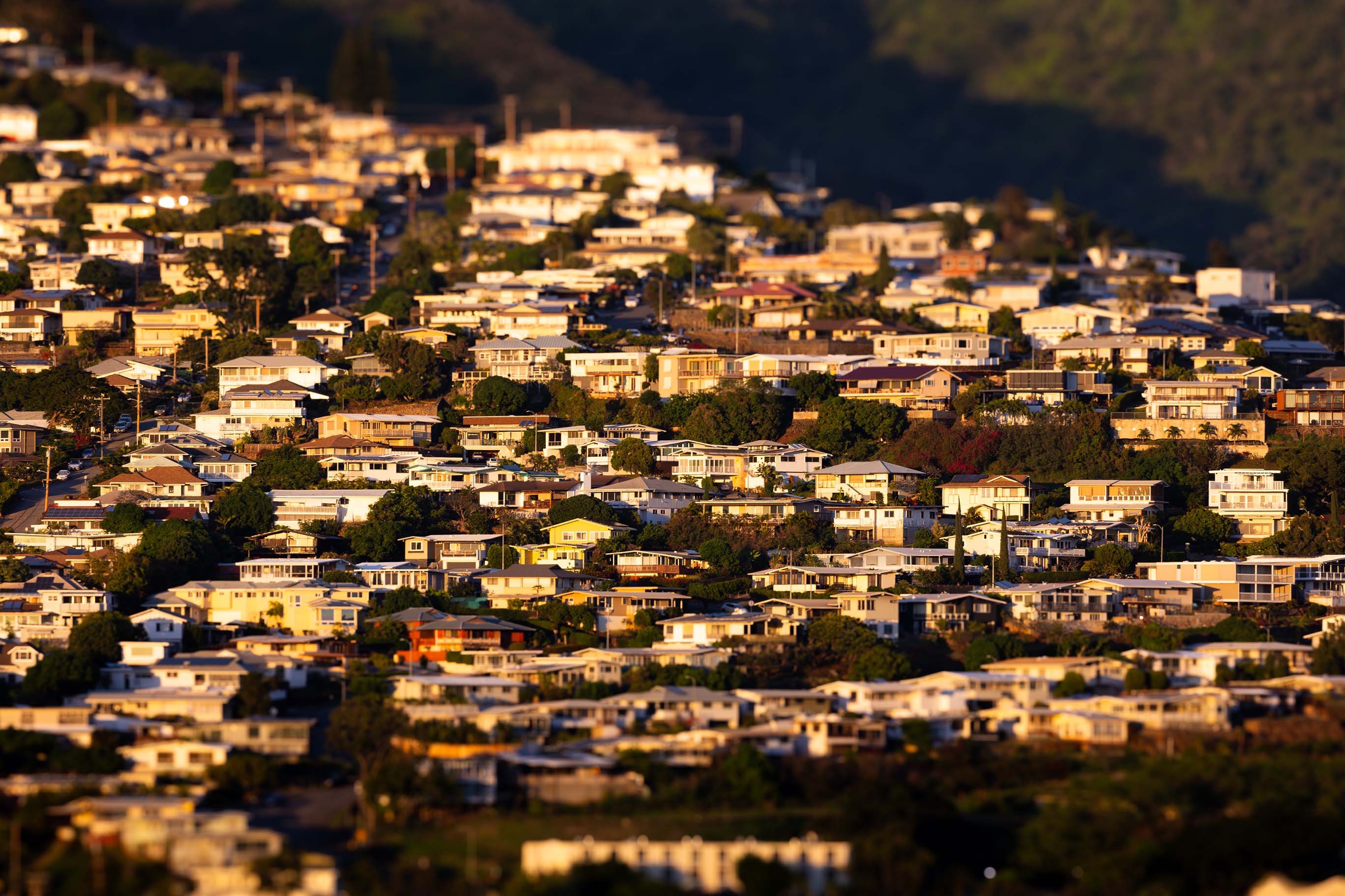 Residential hillside homes in Honolulu, Oʻahu lit by late afternoon sun